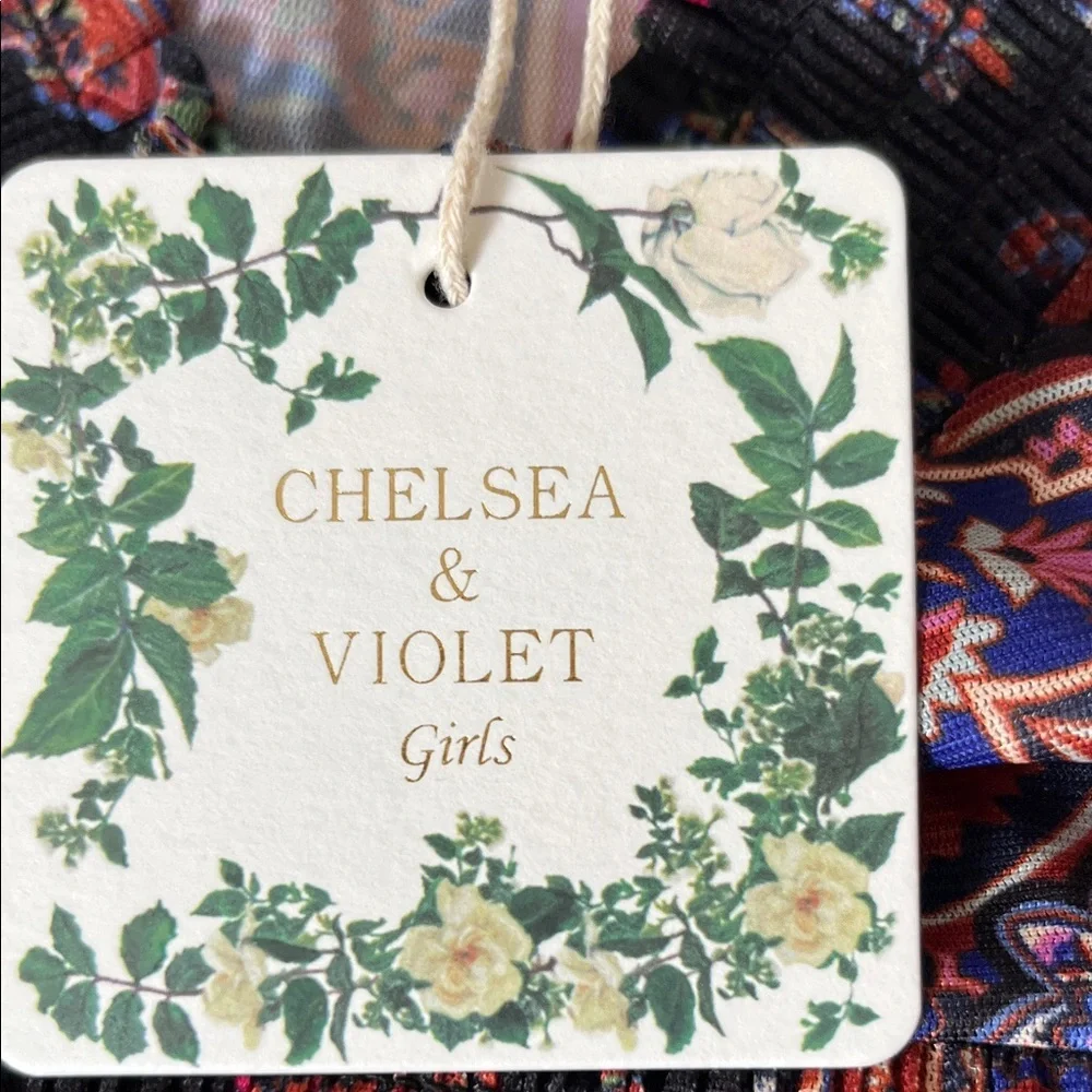 Chelsea & Violet Black Floral Smocked Peplum Blouse